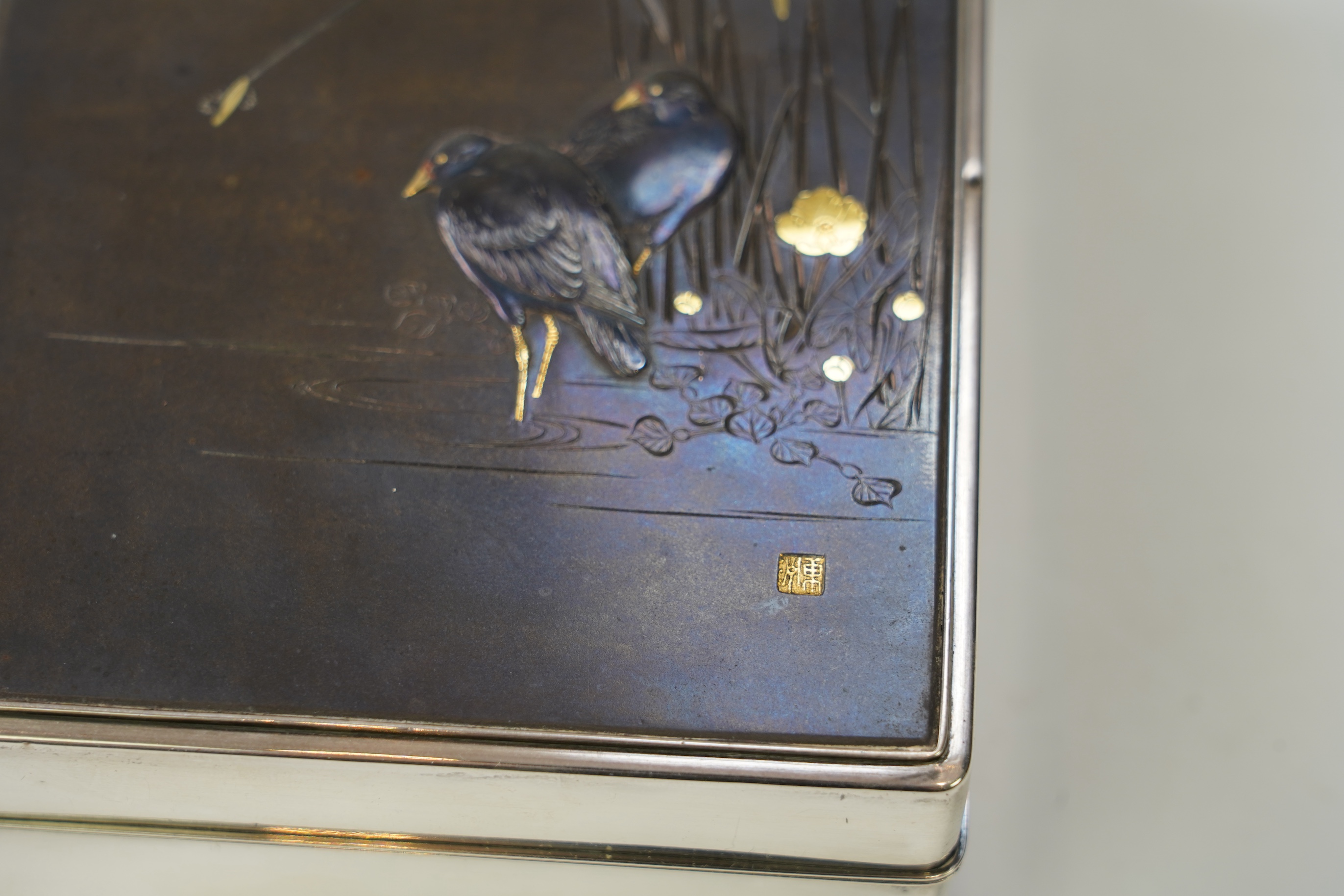 A Japanese shibuichi and shakudo mounted silver box and cover, Taisho period